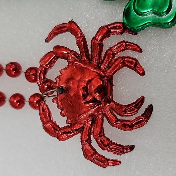 Mardi Gras Purple Crown, Green Shamrock, Red Crab,and Orange shot cup Necklaces. - Picture 5 of 7